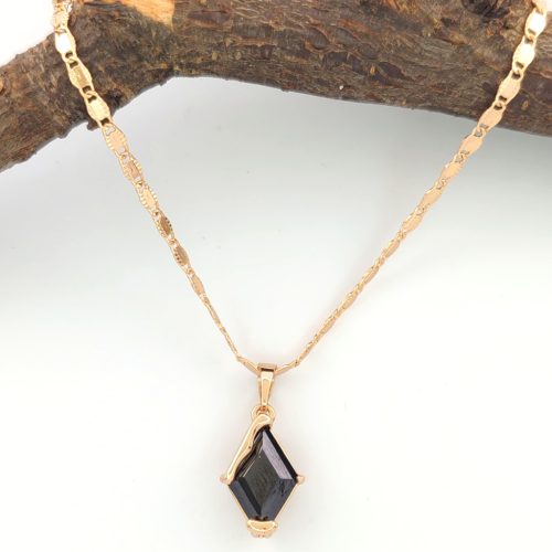 Minni aranyszínű orvosi fém medál fekete kristállyal